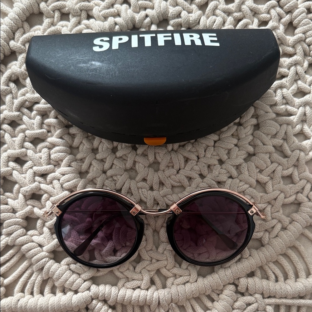 Spitfire Round Sunglasses Black Frames with Rose Gold Accents and Purple Lenses